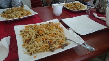 Tsuivan - traditional mongolian noodles with carrot and Beef